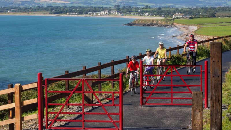 Cyclists on the Waterford Greenway, the longest off-road walking and cycling experience in Ireland. See visitwaterfordgreenway.com for more information