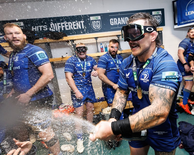 Leinster's Andrew Porter celebrates with champagne in the dressing room after the game. Photograph: Ben Brady/Inpho