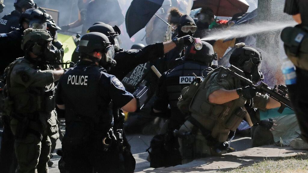 Police pepper spray protesters, Saturday, July 25th, 2020, near Seattle Central Community College in Seattle. Photograph: Ted S Warren/AP