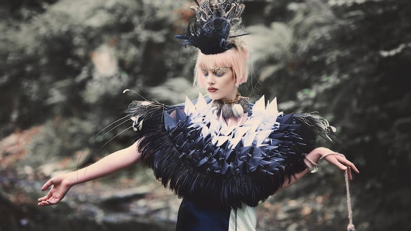 Heron paper origami and feathered cape €250 made to order by Mary Ginnifer Designs. Feathered egg choker €45 Mary Ginnifer Designes. Silk two toned slip dress €40 from Topshop, Opera Lane, Cork. Feather headband €50 and nest motif with feathered and glass eggs headpiece €175 both made to order by Mary Ginnifer Designs