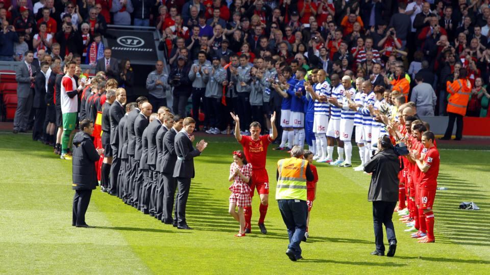Liverpool and QPR players perform a guard of honour for Jamie Carragher prior to the 1-0 win over QPR. Photograph: Peter Byrne/PA Wire