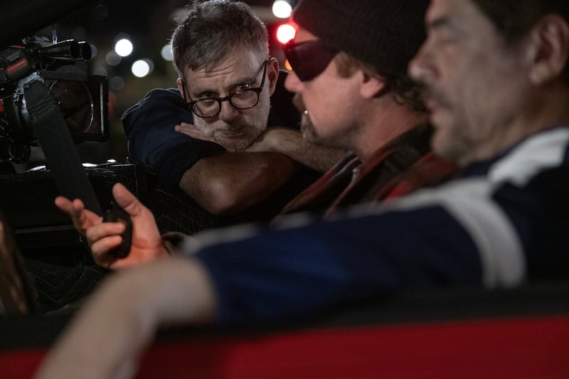 One Battle After Another: Paul Thomas Anderson on set with Leonardo DiCaprio and Benicio Del Toro. Photograph: Warner Bros
