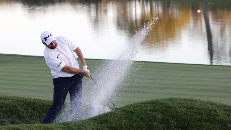 Shane Lowry splashes out of a bunker on the 18th hole during the first round of The Players Championship at TPC Sawgrass in Ponte Vedra Beach, Florida. Photograph: Erik S Lesser/EPA