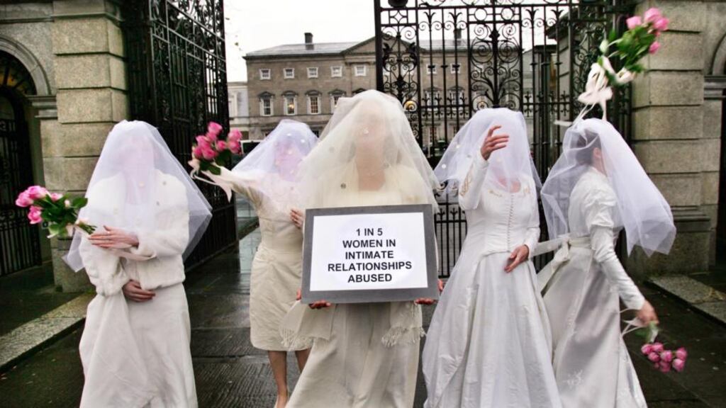 A Women’s Aid protest outside Leinster House to illustrate the fact that one in five women suffer the effects of violence in the home. Photograph: Matt Kavanagh