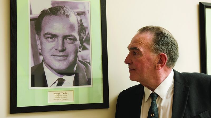 Actor Daragh O’Malley looking at picture of his father, former minister for education Donogh O’Malley.