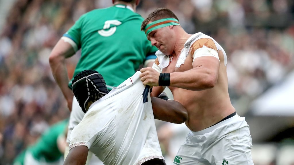 CJ Stander gets to grips with Maro Itoje during Ireland’s defeat to England. Photograph: Dan Sheridan/Inpho