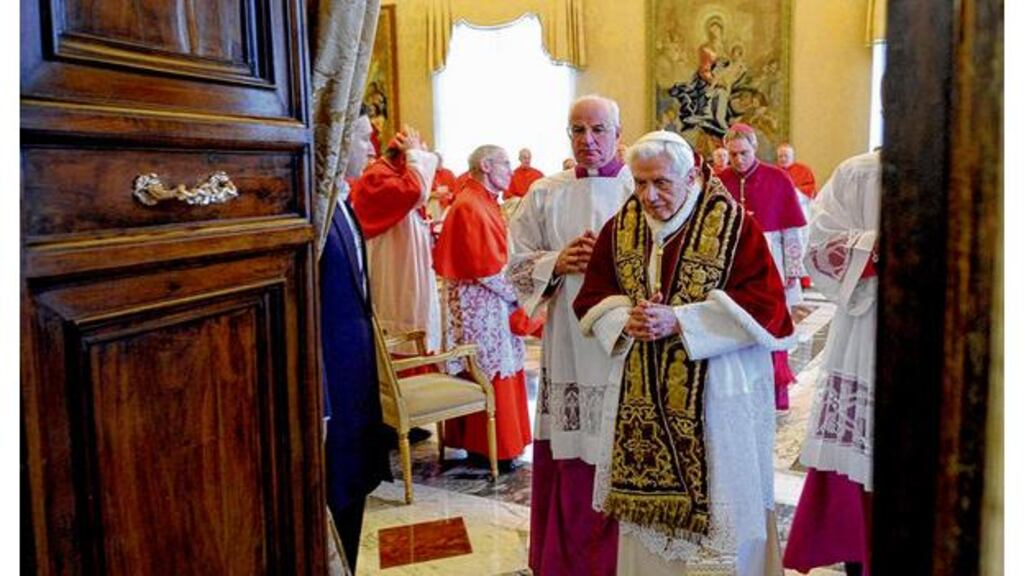 Pope Benedict XVI leaves the meeting of Vatican cardinals at which he announced his resignation. photograph: osservatore romano