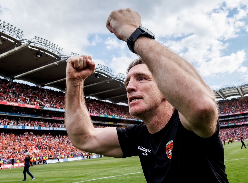 Armagh manager Kieran McGeeney celebrates towards Hill 16 after the game. Photograph: James Crombie/Inpho