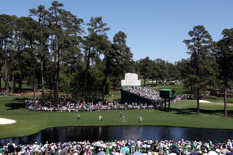 Keegan Bradley of the United States, Tyrrell Hatton of England and Matthieu Pavon of France walk the 16th fairway during the second round of the 2024 Masters on Friday. Photograph: Jamie Squire/Getty Images