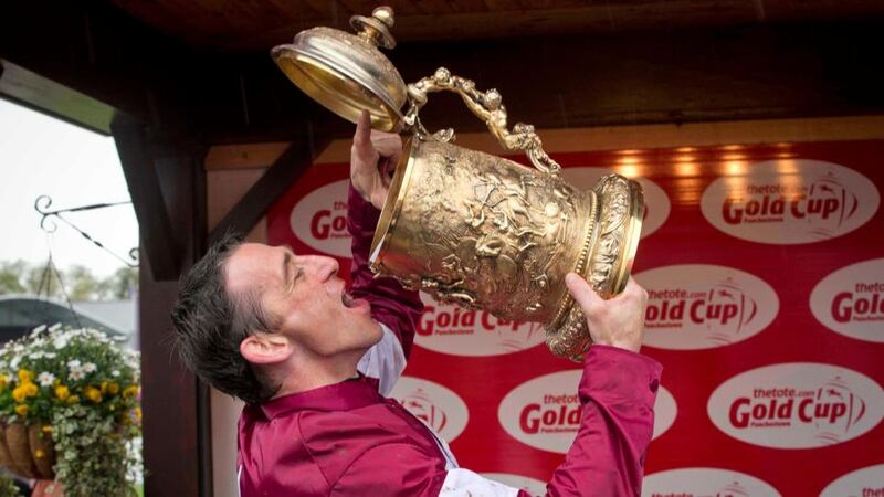 Davy Russell celebrates winning the Punchestown Gold Cup on Sir Des Champs yesterday. Photograph: Morgan Treacy/Inpho