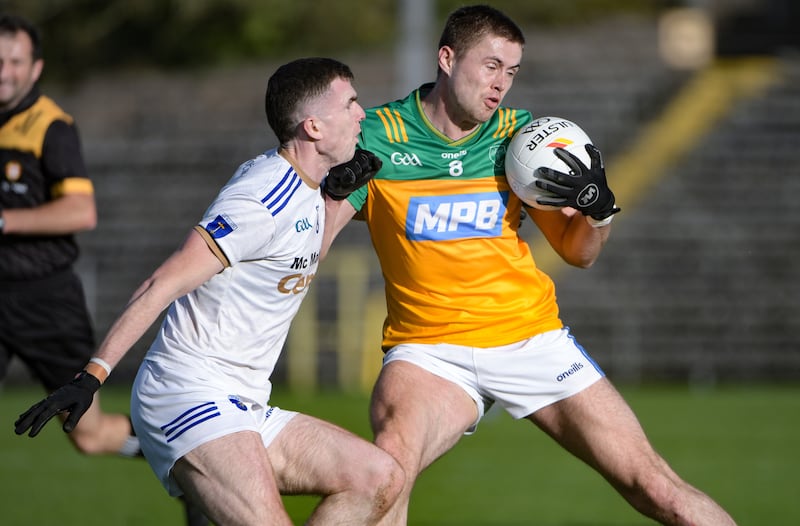 Kieran Gallagher of Naomh Conaill and Micheal McCarville of Scotstown. Photograph: Andrew Paton/Inpho
