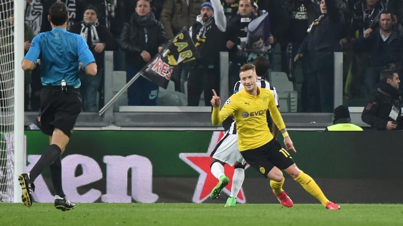 Dortmund’s striker Marco Reus celebrates after scoring his goal. Photograph: Getty Images