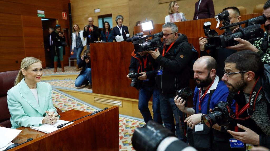 Cristina Cifuentes attends the town hall’s plenary session in Madrid, a day after news broke of the scandal that accuses her of falsifying a university master’s degree. Photograph: Emilio Naranjo/EPA