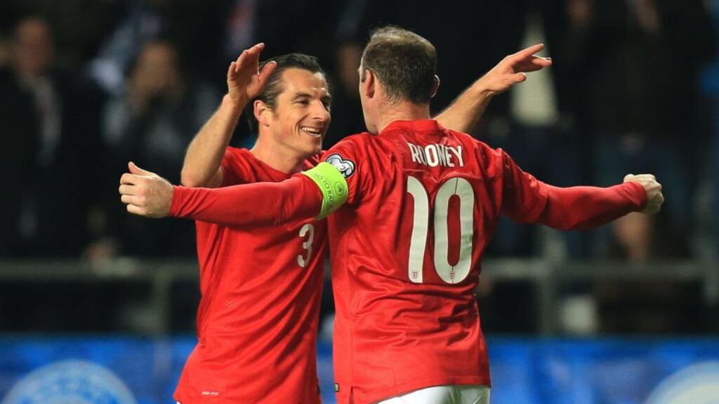 England’s Wayne Rooney (right) celebrates scoring the winner against Estonia with Leighton Baines in Tallinn. Photograph: Mike Egerton/PA Wire