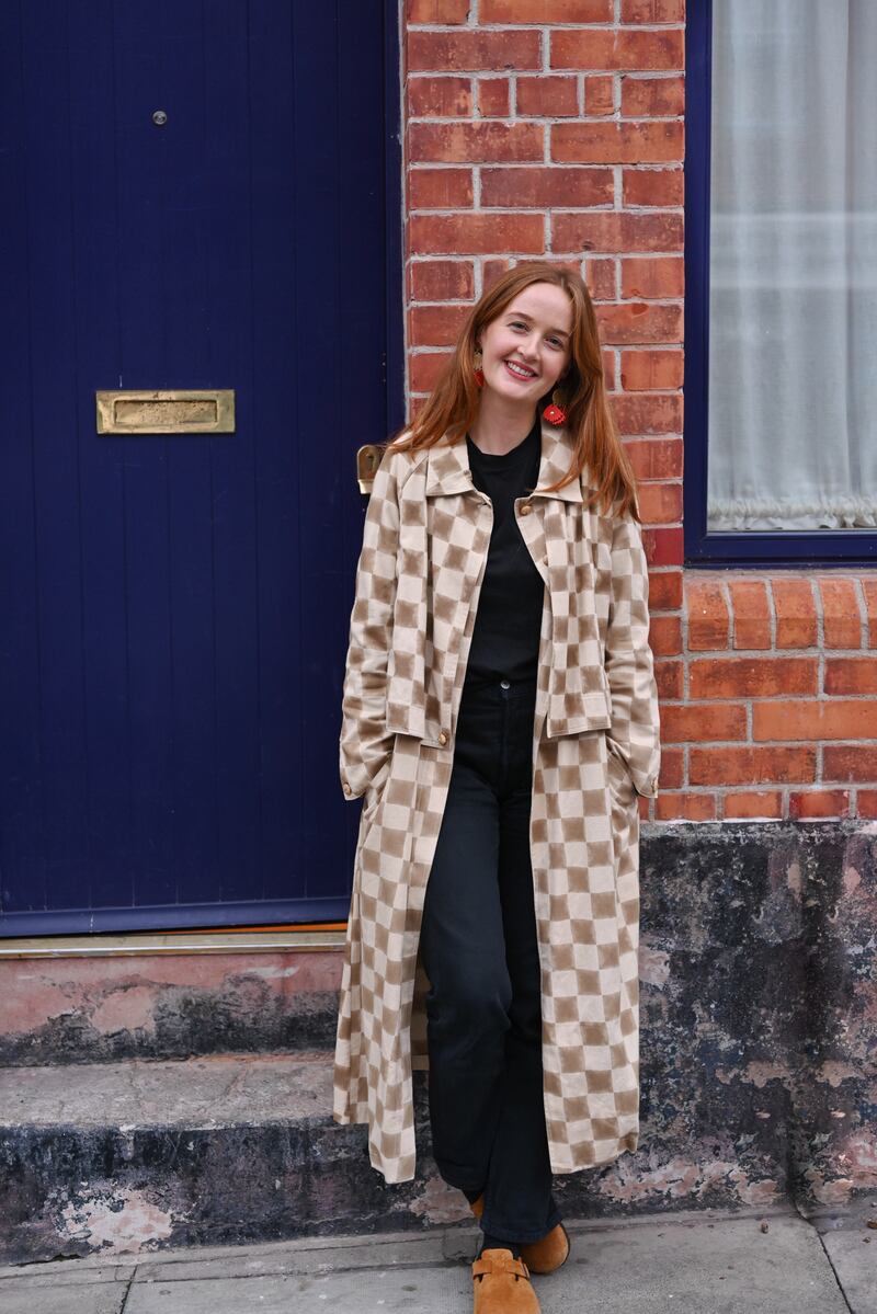 Heather Barnes in block print trench coat by Hamaji and Birkenstock suede clogs