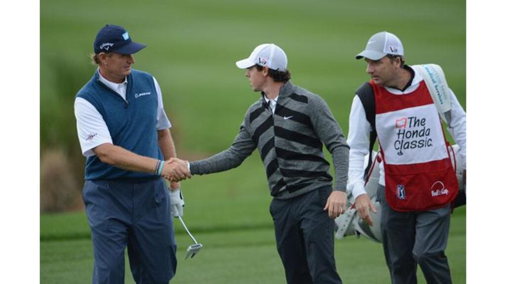 Rory McIlroy shakes hands with Ernie Els before walking off the course during the second round of the Honda Classic in Palm Beach Gardens, Florida. Photograph: Stuart Franklin/Getty Images