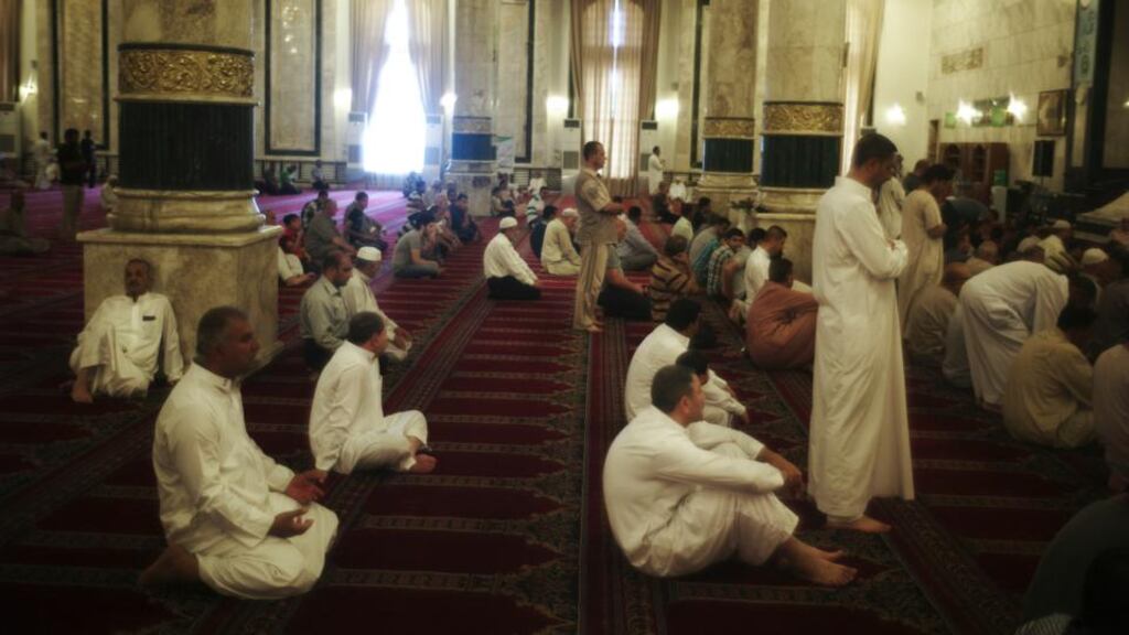 Worshippers inside al Nida mosque, a Sunni center of worship in Baghdad. As the advance of Sunni militants shakes Iraq’s government, Nouri al-Maliki has been widely blamed for loss of territory in the north. Photograph: Ayman Oghanna/The New York Times
