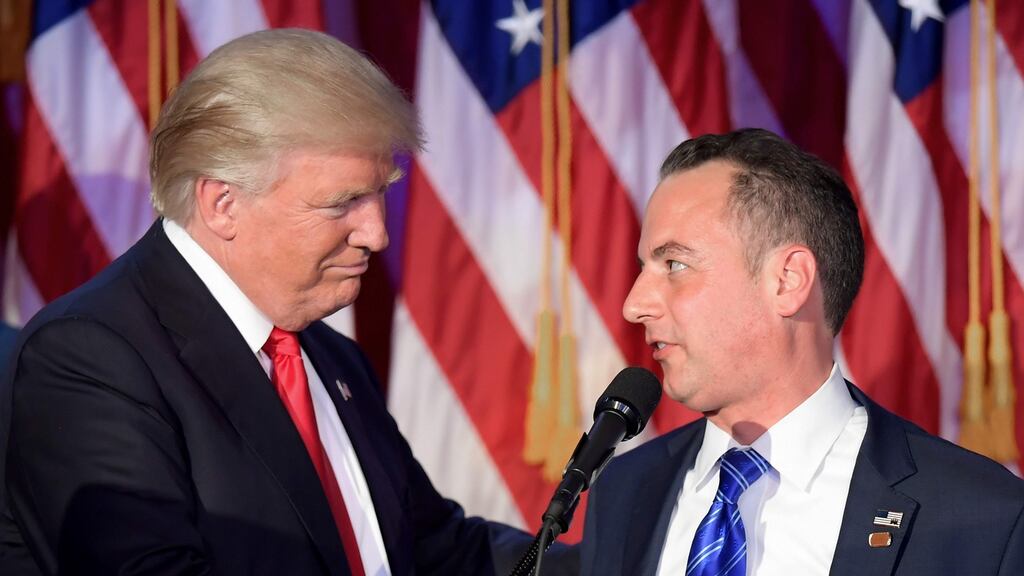 Donald Trump with his new chief of staff Reince Priebus: Mr Priebus spent much of his post-appointment media interviews defending his future colleague Steve Bannon and the latter’s links to white supremacists. Photograph: Jim Watson/AFP/via Getty