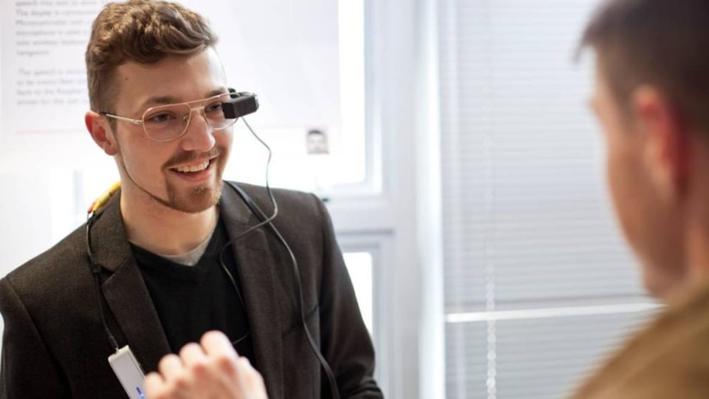 IADT student Jack Luke trying out a wireless assistive display housed in a 3D printed enclosure capable of transcribing speech into text to assist the hearing impaired