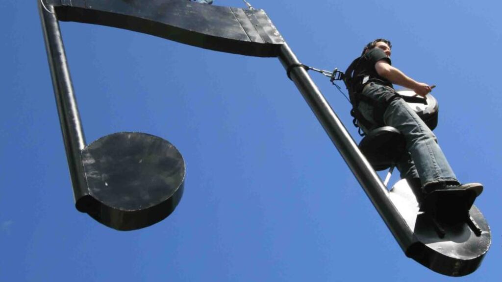 Fire Birds: ‘Music is from six drummers on a six-metre-high stage dressed in angel wings, and there are three red musical notes flying through the air with a family of three musicians.’ Photograph: Jym Art