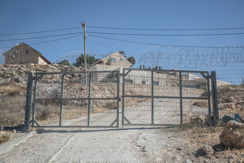 Fences and barbed wire are regularly used to keep Palestinians away from Israeli settlements. Photograph: Sally Hayden