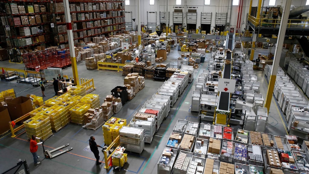 An Amazon fulfilment centre in Baltimore. These centres are where the majority of Amazon’s 500,000 employees work. Photograph: Patrick Semansky/AP