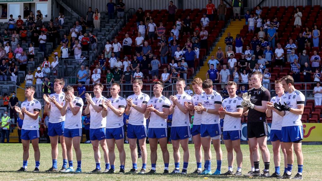 Monaghan players stand for a moment’s applause in memory of  Under-20s captain Brendán Óg Duffy. Photograph: John McVitty/Inpho