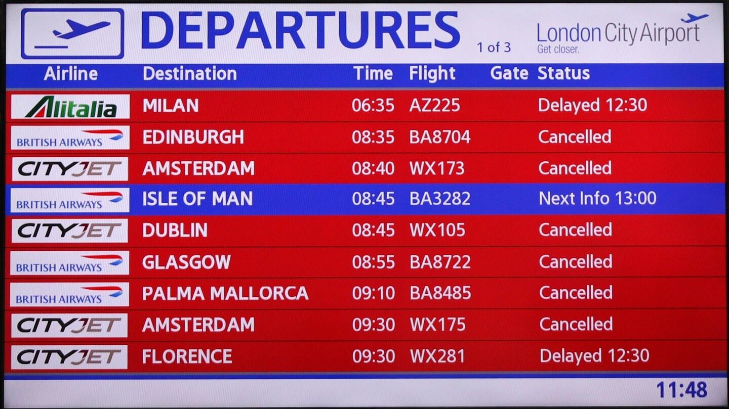 An information screen lists cancelled and delayed flights at City Airport after a protest closed the runway in London. Photograph: Reuters