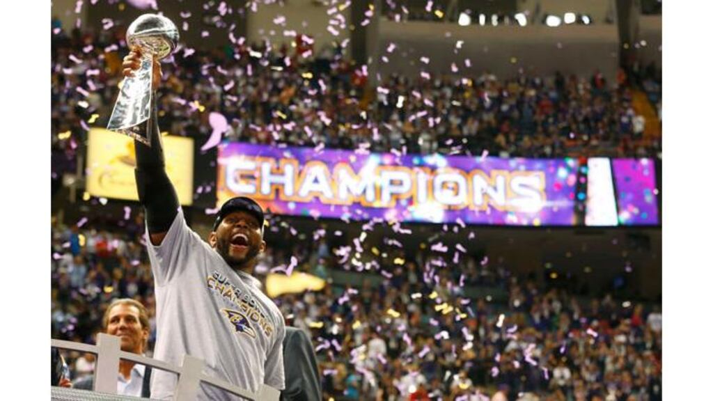 Baltimore Ravens inside linebacker Ray Lewis hoists the Vince Lombardi Trophy. Photograph: Jeff Haynes/Reuters