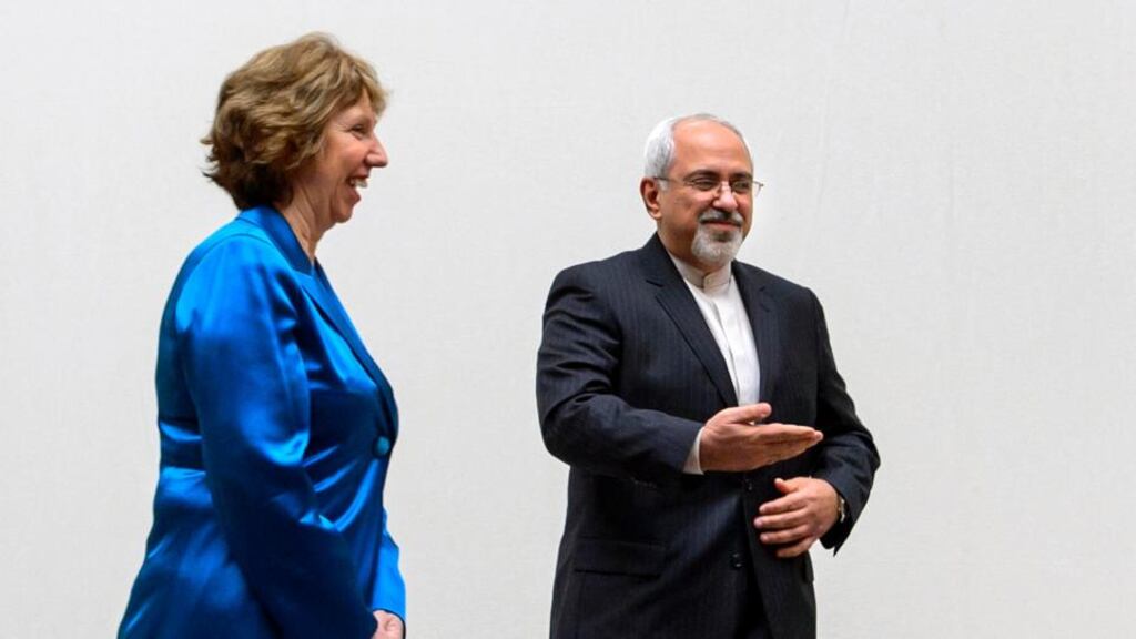 EU foreign policy chief Catherine Ashton speaks with Iranian foreign minister Mohammad Javad Zarif last night in Geneva, after he gave an hour-long presentation on Iran’s proposals to end the nuclear deadlock. Photograph: Fabrice Coffrini/Reuters
