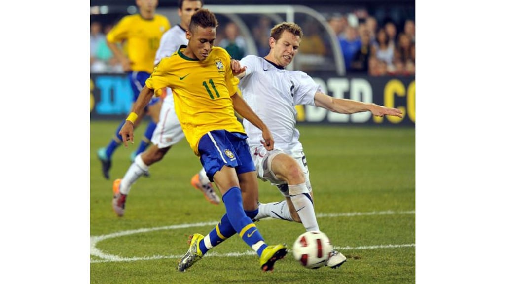 Brazil's Neymar challenges Jonathan Spector of the USA for the ball in the second half of their international friendly at New Meadowlands Stadium in East Rutherford, New Jersey, on August 10th, 2010. - (Photograph: Ray Stubblebine/REUTERS)