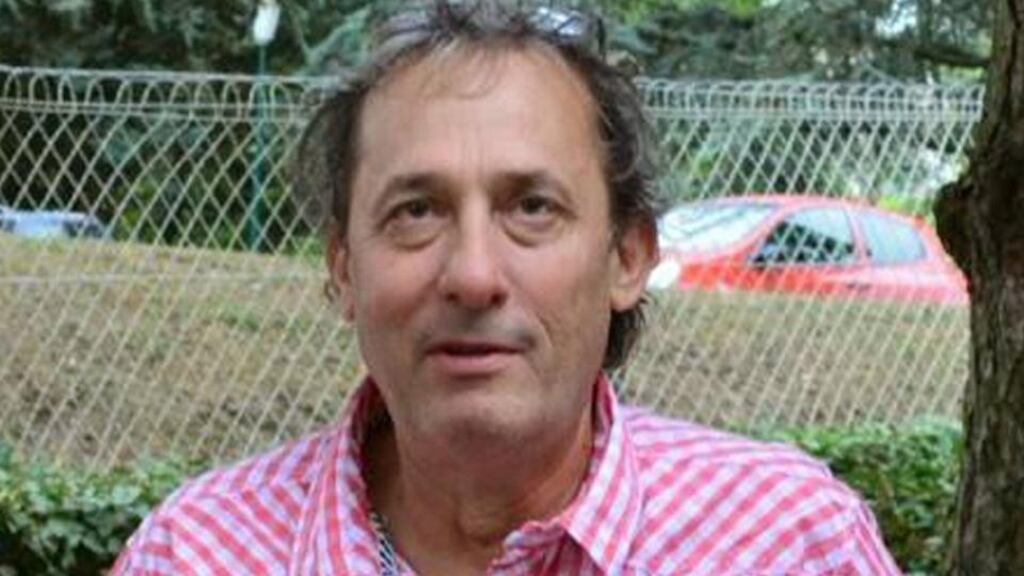 Several hundred people gathered outside a housing project in the town of Fontaines-sur-Saone to honour the slain businessman Mr Herve Cornara (54). Photograph: AFP