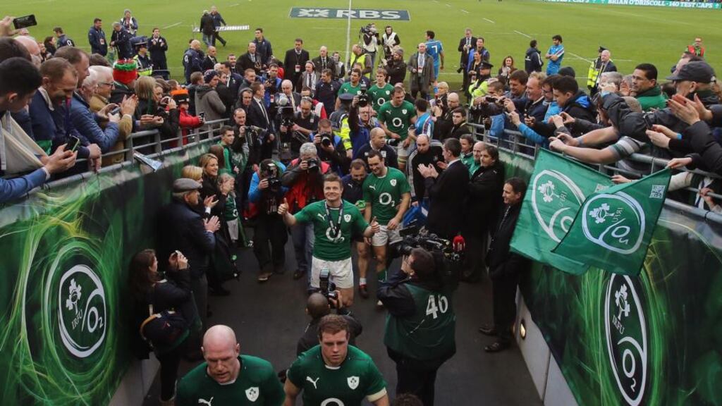Brian O’Driscoll leaves the pitch after his his last home game for Ireland. Photograph: Niall Carson/PA Wire.