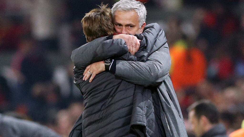 Manchester United manager Jose Mourinho celebrates victory with a member of his coaching staff. Photograph: PA