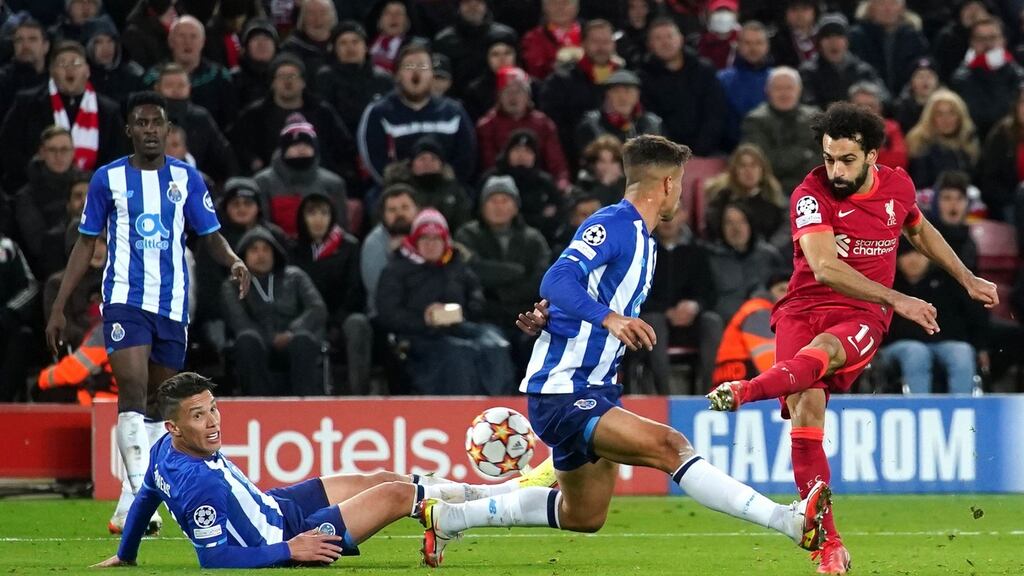 Mohamed Salah scores Liverpool’s second in their win over Porto. Photograph: Peter Byrne/PA