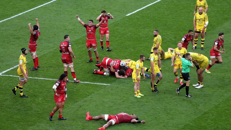 Toulouse players celebrate at the final whistle of their Champions Cup final win over La Rochelle. Photograph: David Davies/PA