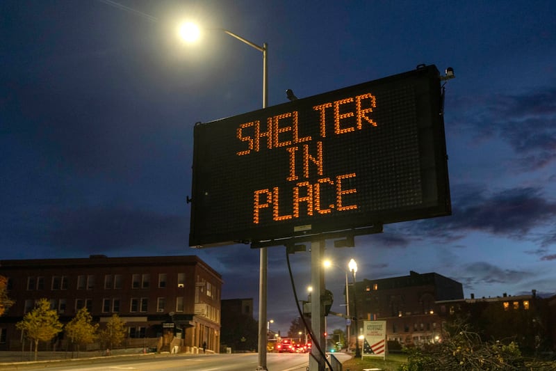 A sign advises residents to stay at home in Lewiston while the gunman
remains at large. Photograph: Robert F Bukaty/ AP