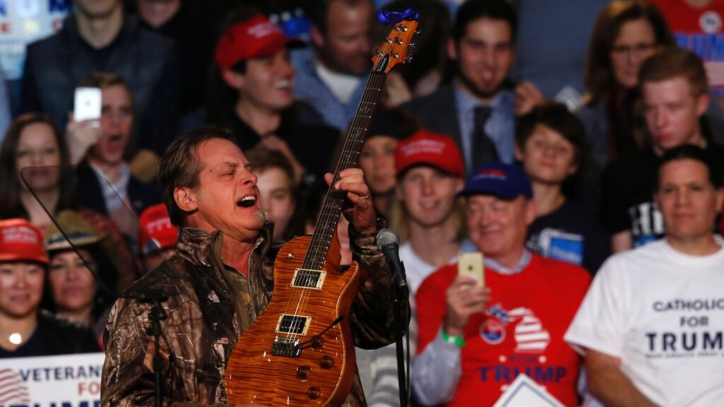 Ted Nugent performs  prior to the arrival of  Donald Trump and Mike Pence for their final campaign event of the 2016 presidential election. Photograph: Jeff Kowalsky/AFP/Getty