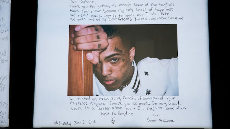 Notes of appreciation were left by fans at a memorial and viewing for rapper XXXTentacion. Photograph: Scott McIntyre/The New York Times.
