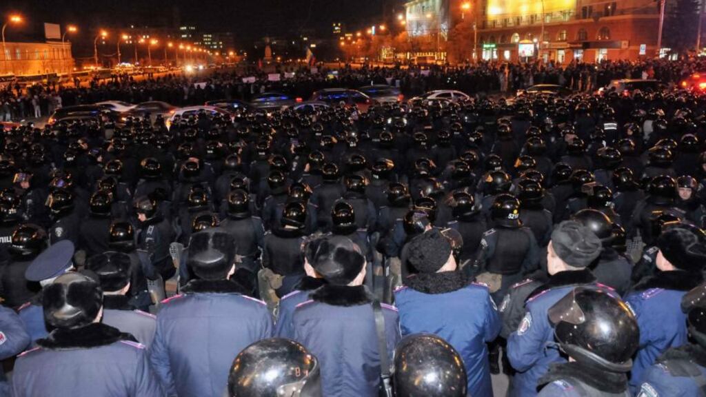 Riot police stand guard in front of a regional government building yesterday as pro-Russian demonstrators take part in a rally in Kharkiv, Ukraine’s second-largest city. Photograph: Reuters