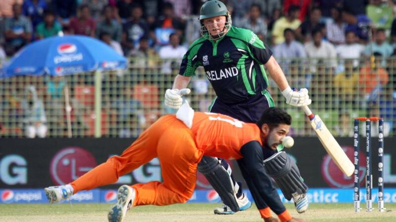 Ireland’s Andrew Poynter is dropped by Ihsan Malik of the the Netherlands in their World Twenty20 Group B match in the International Cricket Stadium in Sylhet, Bangladesh. Photograph: Barry Chambers/Inpho