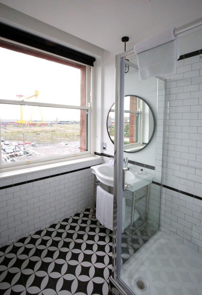 A bathroom in the new hotel, which looks out at the gantry cranes on Belfast’s docklands. Photograph: Press Eye/Darren Kidd