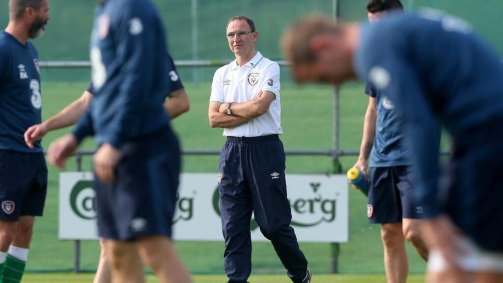 Republic of Ireland manager Martin O’Neill runs the rule over his players during training in Malahide this morning. Photograph: Donall Farmer/Inpho