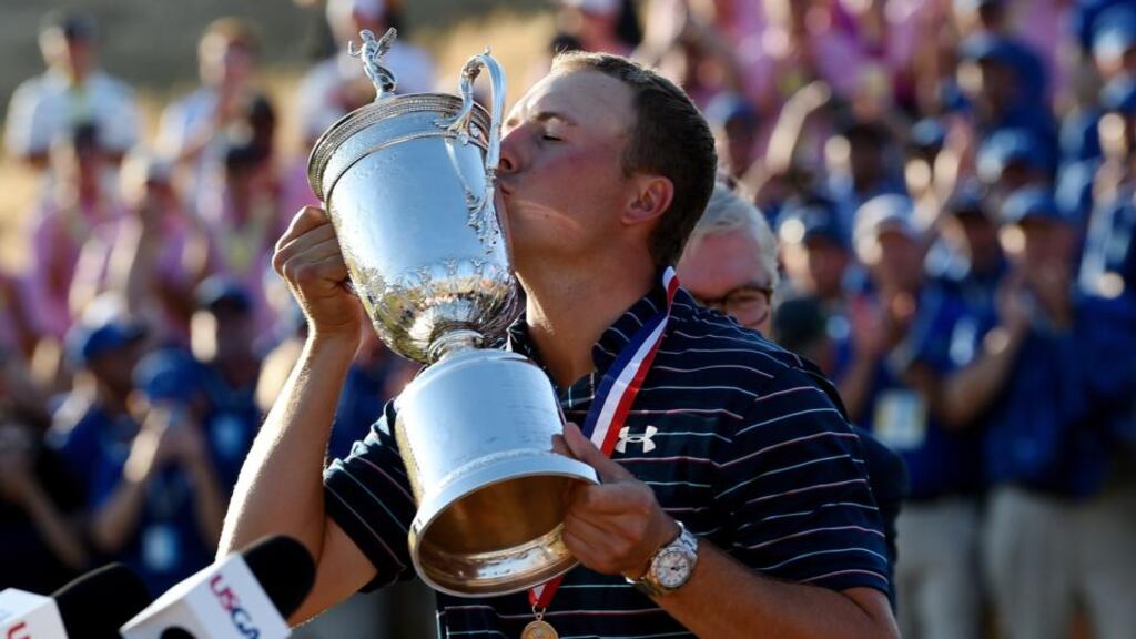 Jordan Spieth kisses the trophy after winning the US Open at Chambers Bay in University Place, Washington. Photo: Ross Kinnaird/Getty Images