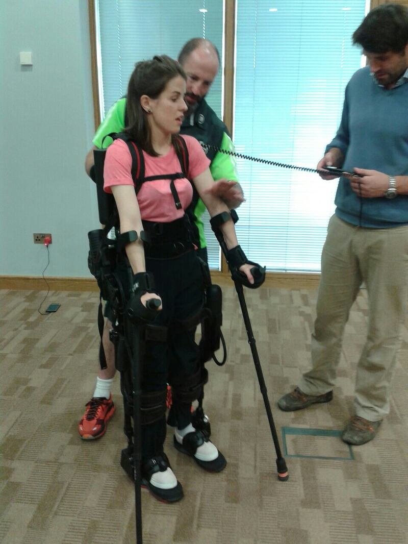 Geraldine Lavelle using a bionic suit which enables  people with paralysis or lower limb weakness to passively walk