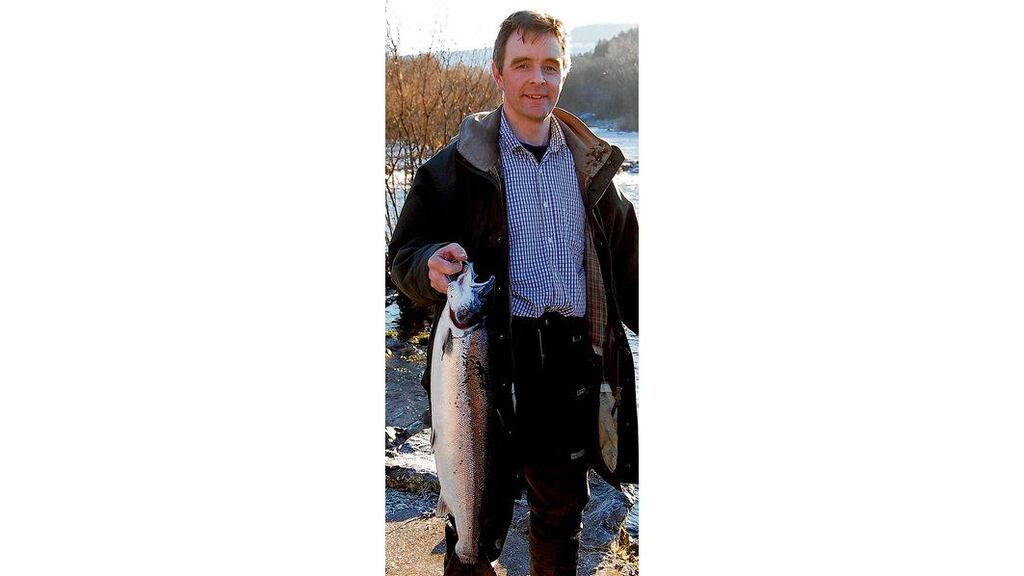 Brian McEvoy from Enniskillen proudly displays the first salmon of the year from the River Drowes in Co Leitrim. The fish weighed 4.5lb and fell to a yellow belly Devon minnow