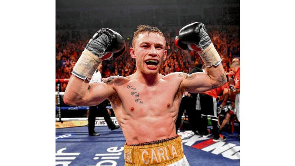 Carl Frampton celebrates victory over Kiko Martinez