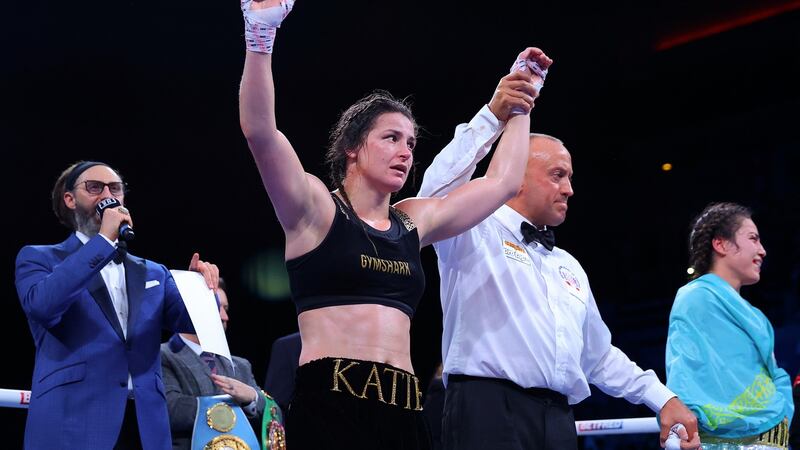 Katie Taylor celebrates victory over Firuza Sharipova to retain her world lightweight champon belts at the M&S Bank Arena in Liverpool, England. Photograph: Alex Livesey/Getty Images