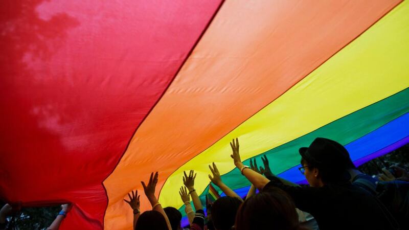 A rainbow flag during a lesbian, gay, bisexual and transgender (LGBT) Pride Parade. South Dublin County Councillors have heard LGBT teachers dare not reveal personal relationships in the classroom. Photograph: Reuters