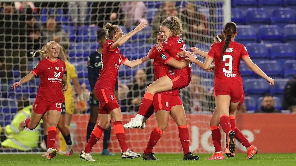 Leanne Kiernan of Liverpool is congratulated on scoring for her side against Aston Villa. She scored 13 goals this season as Liverpool sealed promotion. Photograph: Lewis Storey/Getty Images